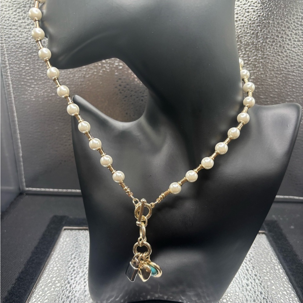 Elegant Pearl and Gold Necklace with Turquoise charm, a heart and a lock.